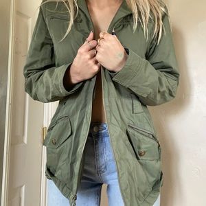 green waterproof jacket